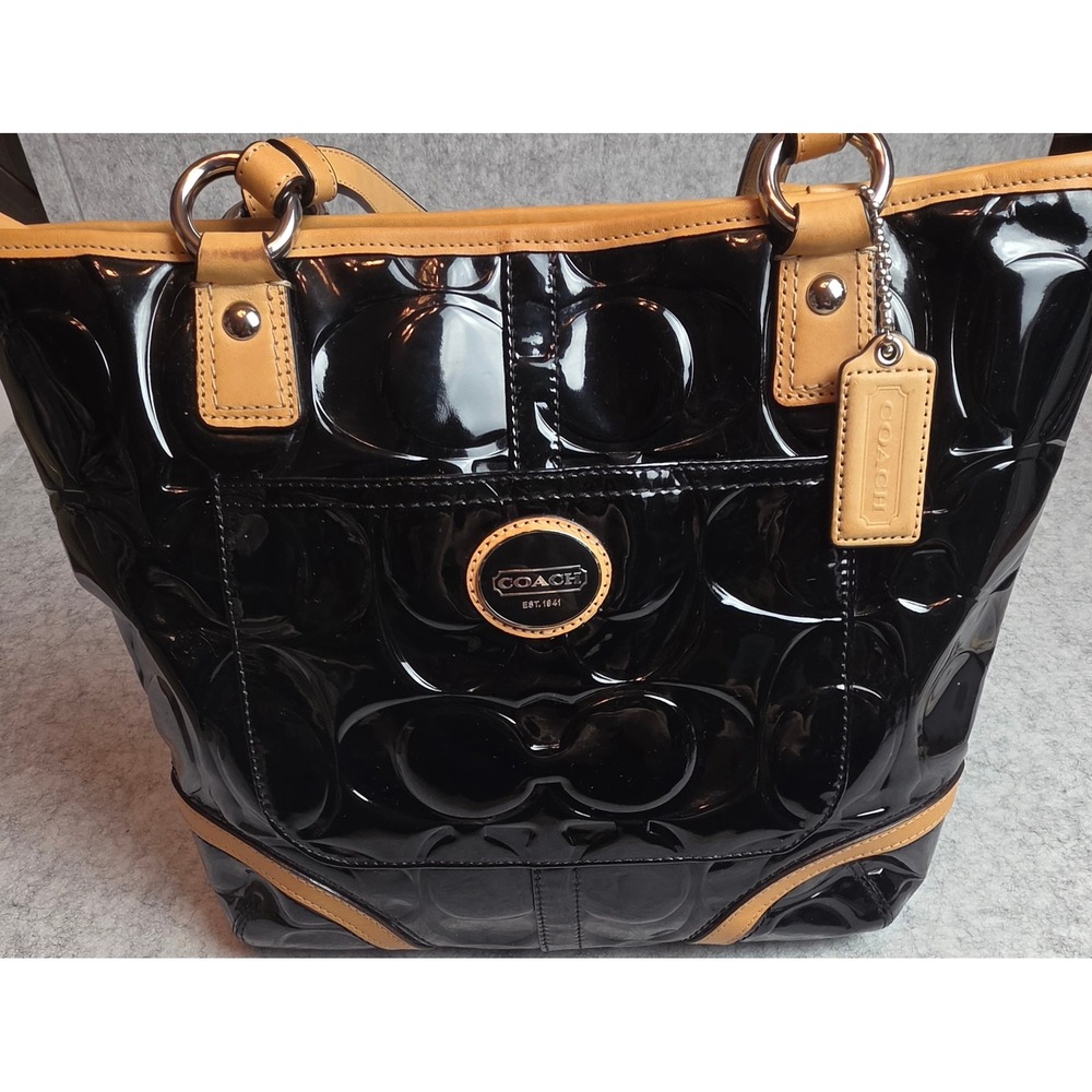 Coach Taylor Signature Embossed Patent Leather Tote Bag Black Tan F22322